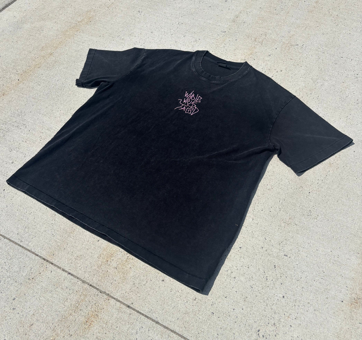 Black Japanese graffiti streetwear t-shirt front view close up